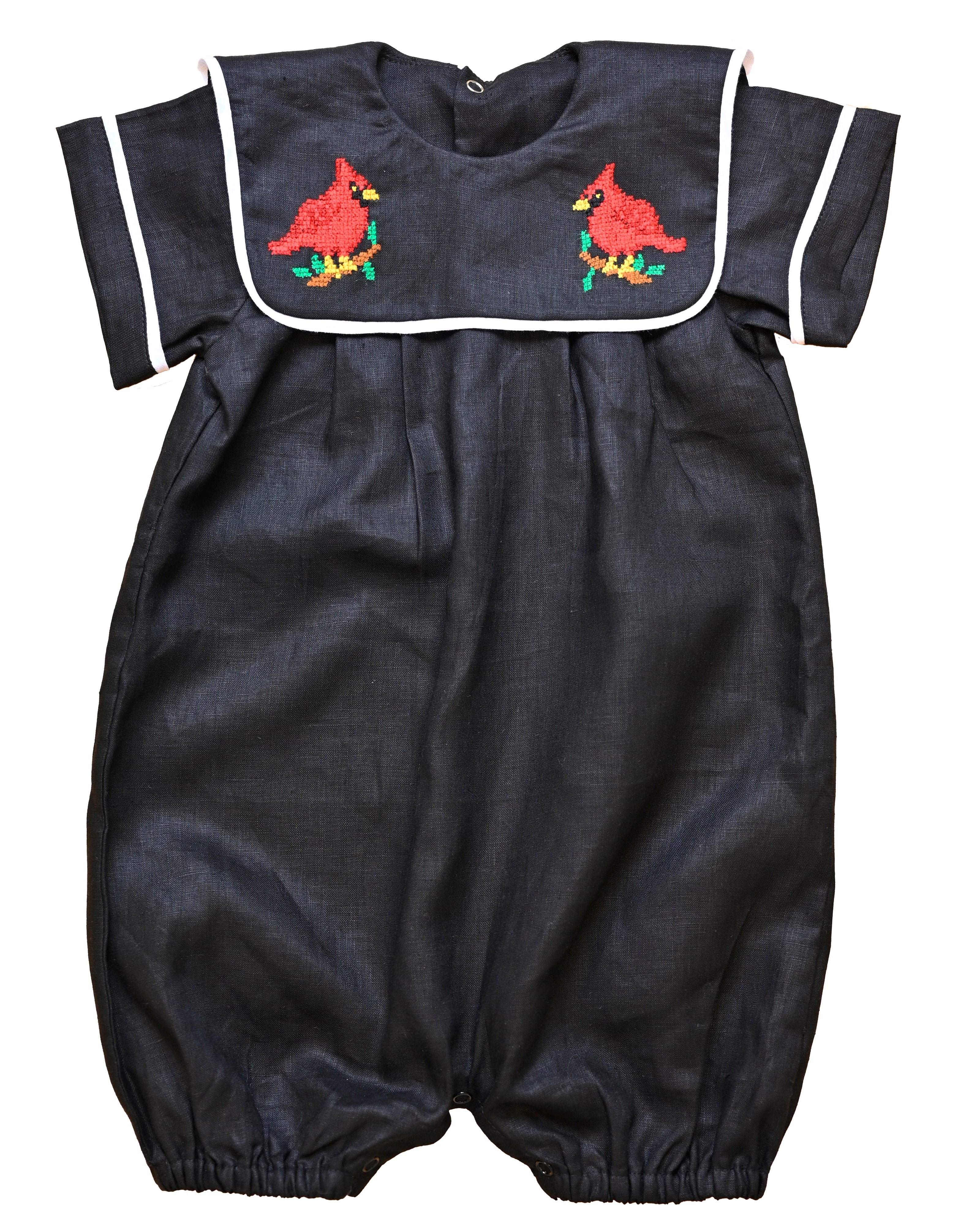 Cardinal Romper 100% natural linen and adorned with an artisan-embroidered cardinal bird