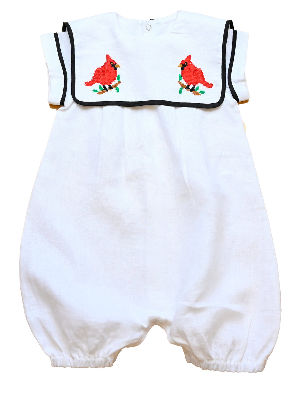 Mameluco Cardinal de lino 100% natural y adornado con un cardenal bordado artesanalmente